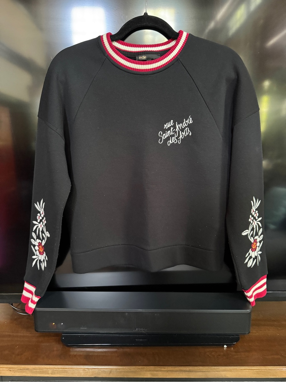Maje Black Crew Sweater with Red & White Trim and Floral Sleeve Embroidery